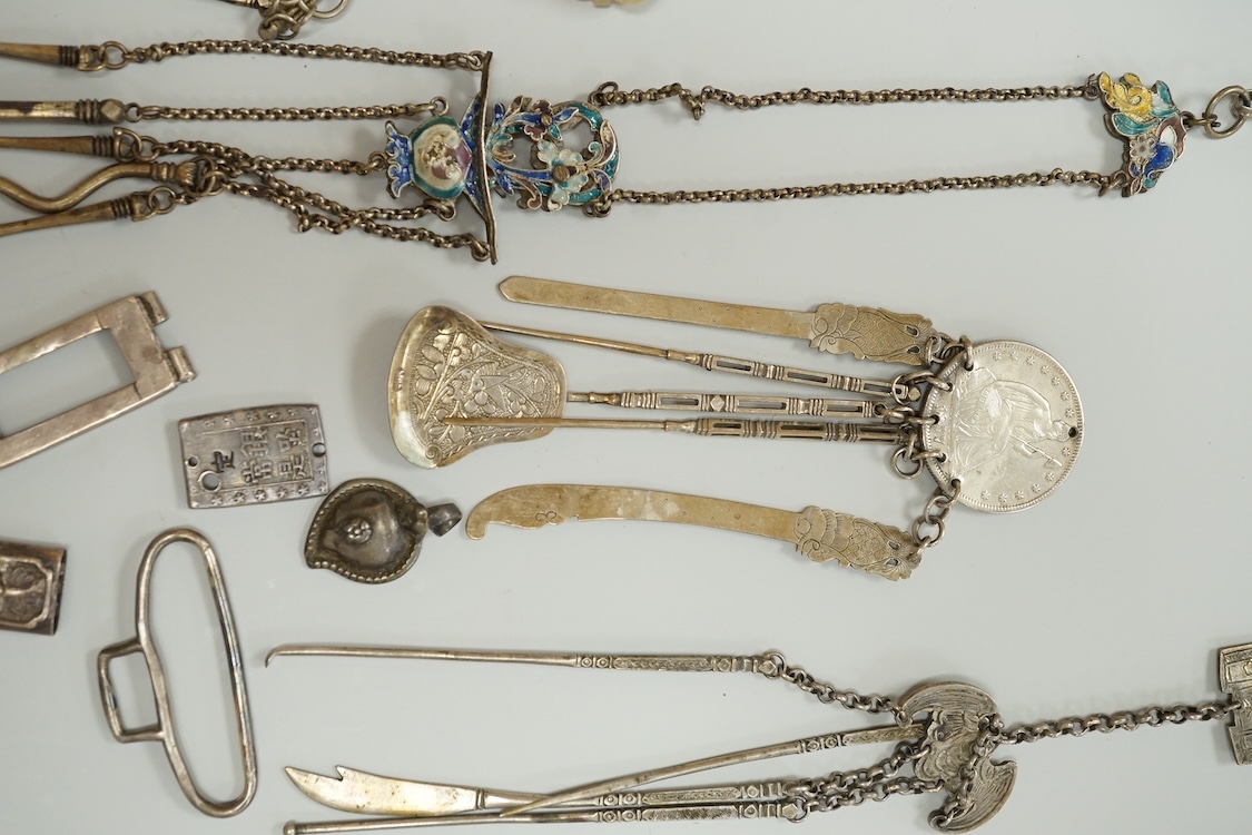 A collection of Chinese Straits white metal hooks, a chatelaine, South East Asian coinage and other items, etc.